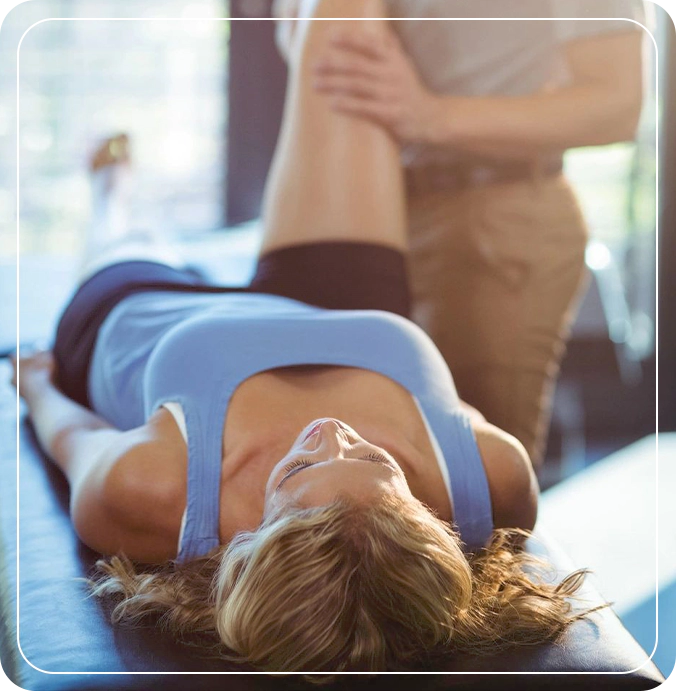 A woman is laying on the ground with her legs crossed.